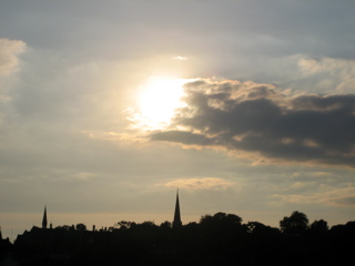 The sun sets over Harrow on the Hill