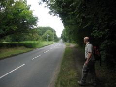 Tom strides over the road